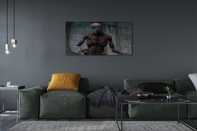 Quadro em tela Uma figura assustadora no prédio