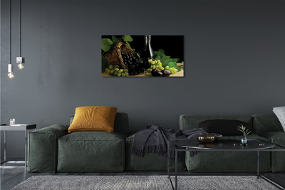 Quadro em tela Cesta de folhas, uvas, vinho