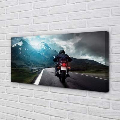 Quadro em tela Motocicleta montanhas estrada homem céu
