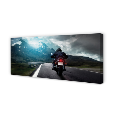 Quadro em tela Motocicleta montanhas estrada homem céu