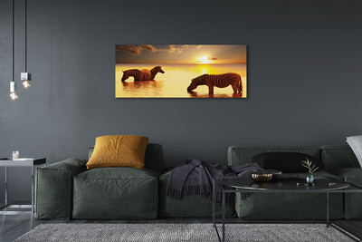 Pintura em tela Zebras na água do pôr do sol