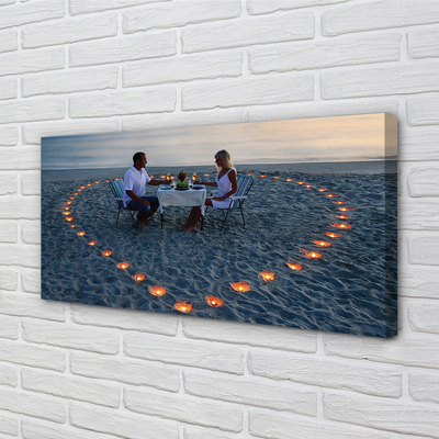Quadro em tela Coração de velas casal mar