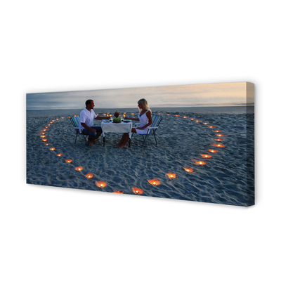 Quadro em tela Coração de velas casal mar