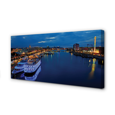 Quadro em tela Navio mar cidade céu noturno