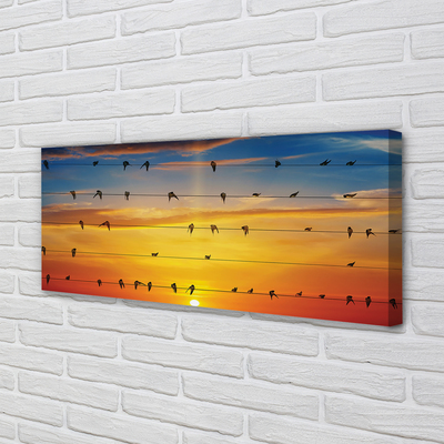 Pintura em tela Pássaros em cordas ao pôr do sol