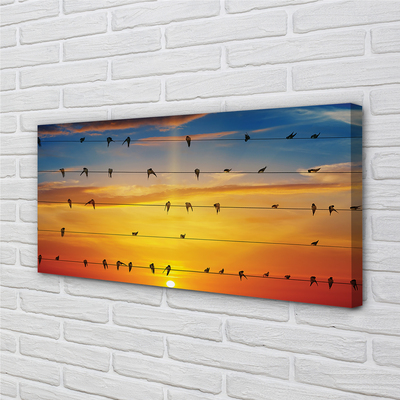 Pintura em tela Pássaros em cordas ao pôr do sol