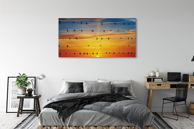 Pintura em tela Pássaros em cordas ao pôr do sol