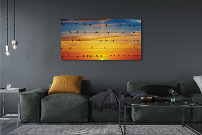 Pintura em tela Pássaros em cordas ao pôr do sol