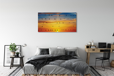 Pintura em tela Pássaros em cordas ao pôr do sol