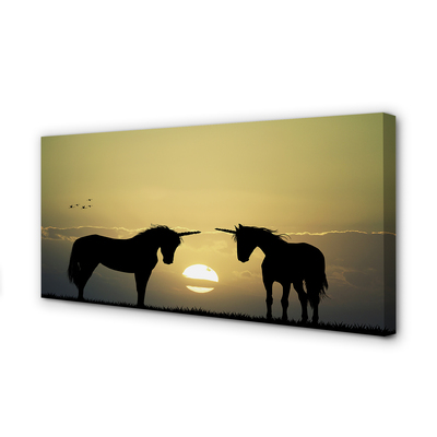 Quadro em tela Unicórnios do pôr do sol no campo