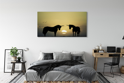 Quadro em tela Unicórnios do pôr do sol no campo