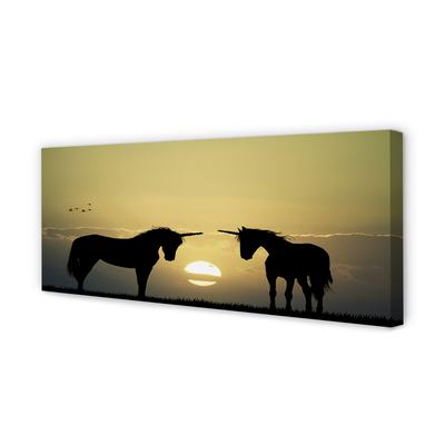 Quadro em tela Unicórnios do pôr do sol no campo