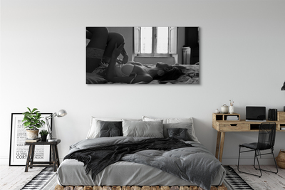 Quadro em tela Uma mulher deitada e olhando pela janela