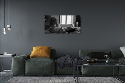 Quadro em tela Uma mulher deitada e olhando pela janela