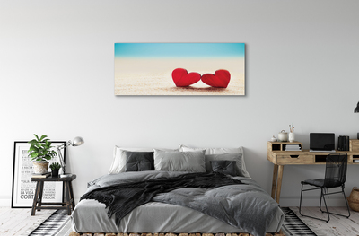 Quadro em tela Corações de areia vermelha do mar