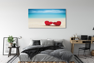 Quadro em tela Corações de areia vermelha do mar