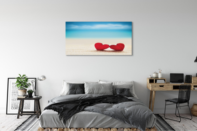 Quadro em tela Corações de areia vermelha do mar
