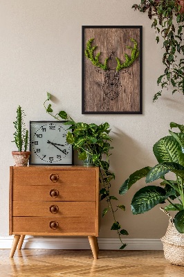 Quadro de musgo Cabeça de veado em um fundo de madeira