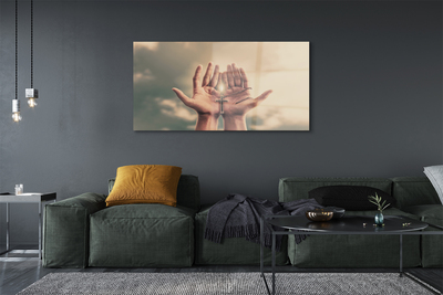 Quadro de vidro Mãos cruzam o céu