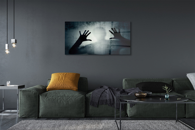 Quadro de vidro Sombra da mão e da cabeça da figura