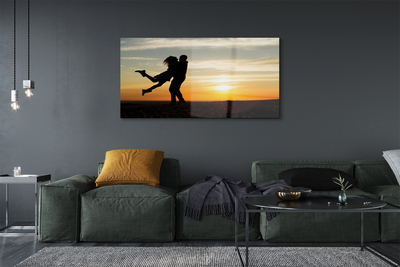 Quadro de vidro Pessoas pôr do sol nuvens