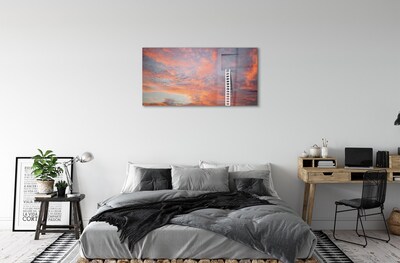 Quadro de vidro Pôr do sol no céu da escada