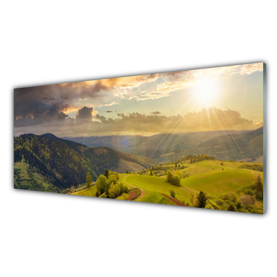 Quadro de vidro Pôr do sol no prado das montanhas
