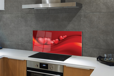 Painel de vidro Corações fundo vermelho