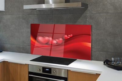 Painel de vidro Corações fundo vermelho