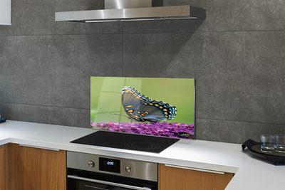 Painel de vidro Borboleta colorida em flores