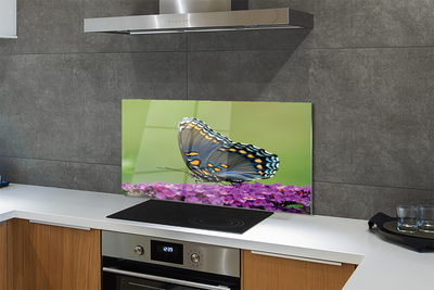 Painel de vidro Borboleta colorida em flores