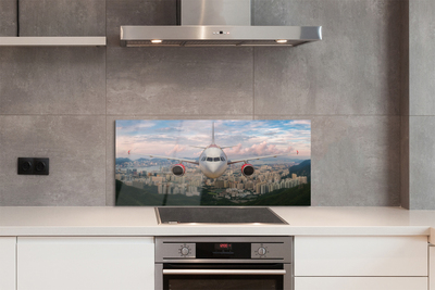 Painel de vidro avião cidade montanhas