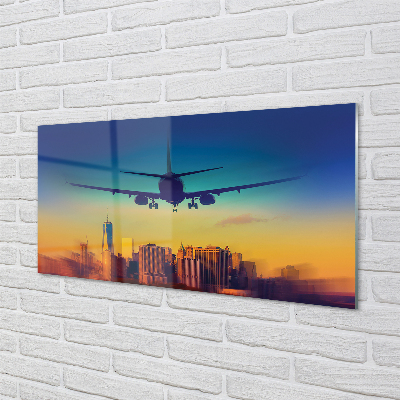 Painel de vidro Cidade nuvens avião pôr do sol