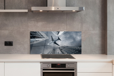 Painel de vidro Cidade nuvens avião céu