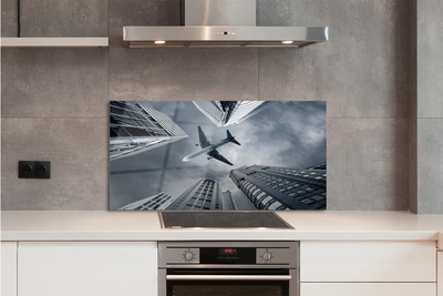 Painel de vidro Cidade nuvens avião céu