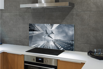 Painel de vidro Cidade nuvens avião céu