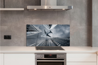 Painel de vidro Cidade nuvens avião céu