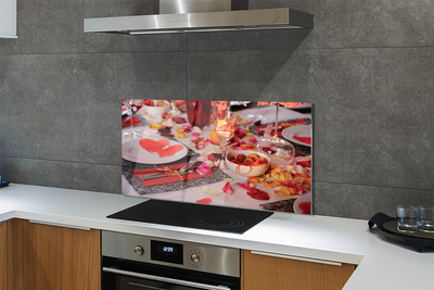 Painel de vidro Copos de jantar com pétalas de rosa e corações