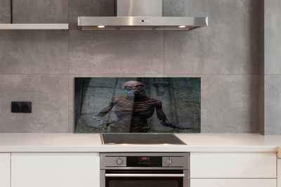 Painel de vidro Uma figura assustadora no prédio