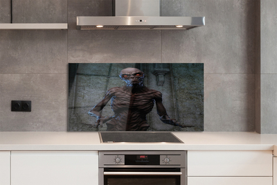 Painel de vidro Uma figura assustadora no prédio