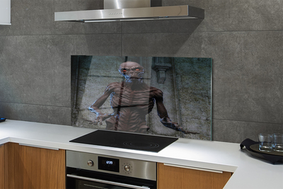 Painel de vidro Uma figura assustadora no prédio