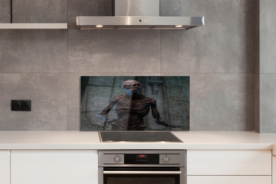 Painel de vidro Uma figura assustadora no prédio