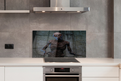 Painel de vidro Uma figura assustadora no prédio