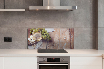 Painel de vidro Um copo de nozes e uvas