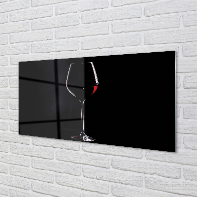 Painel de vidro Fundo preto com uma taça de vinho