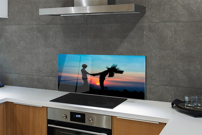 Painel de vidro Pessoas pôr do sol céu