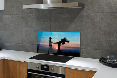 Painel de vidro Pessoas pôr do sol céu