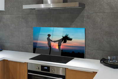 Painel de vidro Pessoas pôr do sol céu