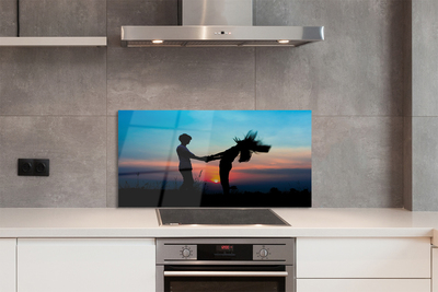 Painel de vidro Pessoas pôr do sol céu