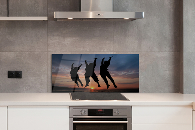 Painel de vidro Pessoas pôr do sol nuvens